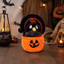 Pumpkin basket crow plush in a spooky Halloween room scene