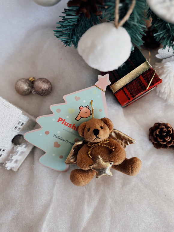 4" Xmas Angel Bear plush with golden wings, face tilted upward.