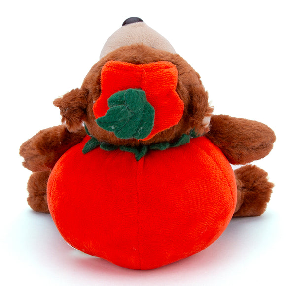 Back view of Halloween Cuddly Monkey Plush showcasing the pumpkin costume