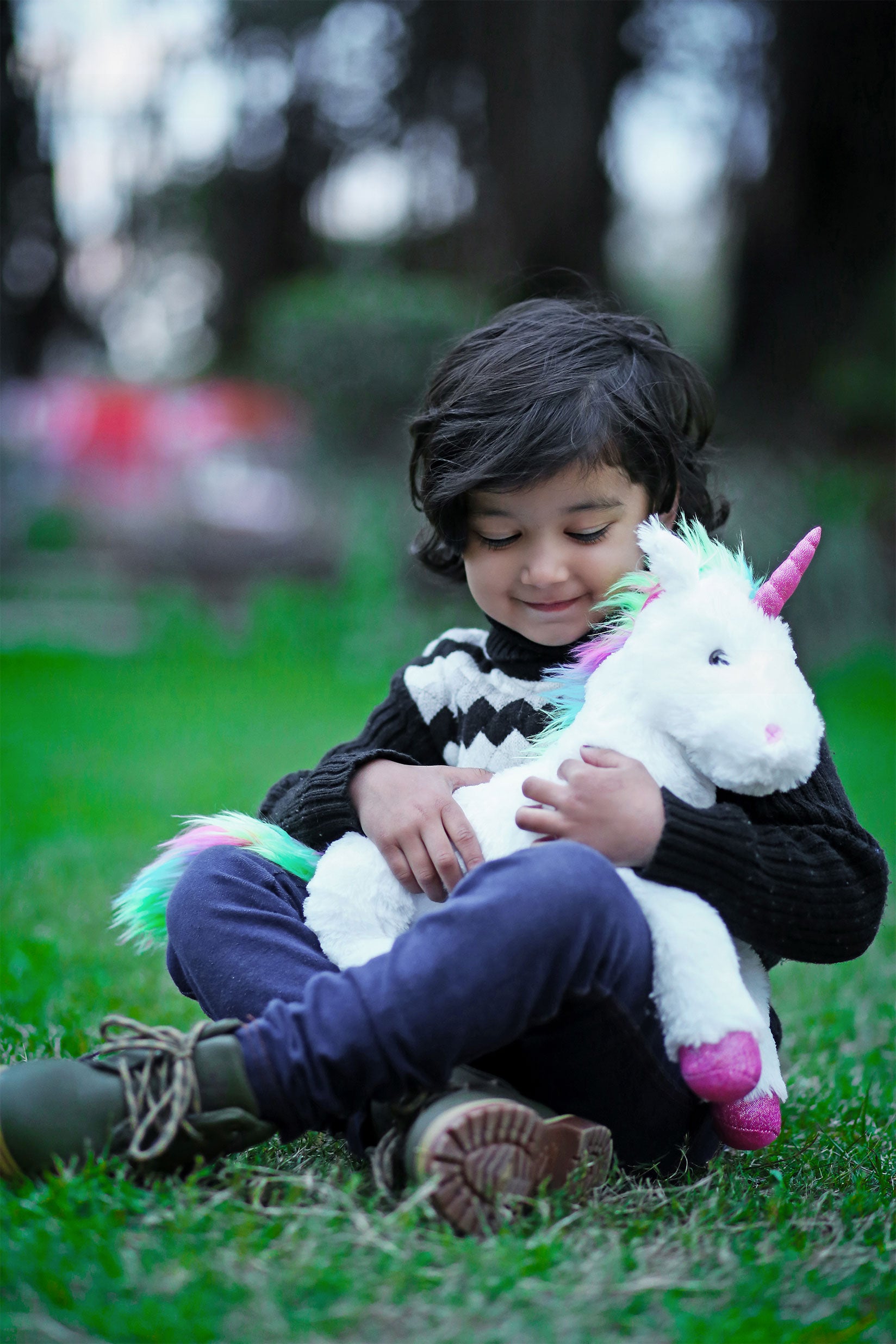 Crystal Unicorn Featuring Sparkling Details and a Magical Design, Held in a Child's Hands by Plushland.